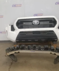 24 TOYOTA TACOMA SR FRONT BUMPER WHITE 040 WITH GRILLES AND RADAR - SEE IMAGES