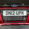 GENUINE FORD FOCUS MK3 ZETEC-S FRONT BUMPER RED CANDY TINT 2011-2015 #DN12
